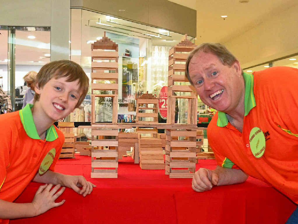 CHOCK-A-BLOCK: Dakota and John Walton had a busy first day running the Timber Tower Challenge in the Rose City Shoppingworld yesterday. CHOCK-A-BLOCK: Dakota and John Walton had a busy first day running the Timber Tower Challenge in the Rose City Shoppingworld yesterday.